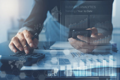 business-man-analysing-market-report-with-business-analytics-dashboard-virtual